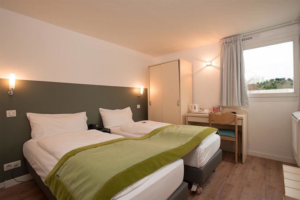 Hotel L'Amandier Nanterre Eksteriør bilde