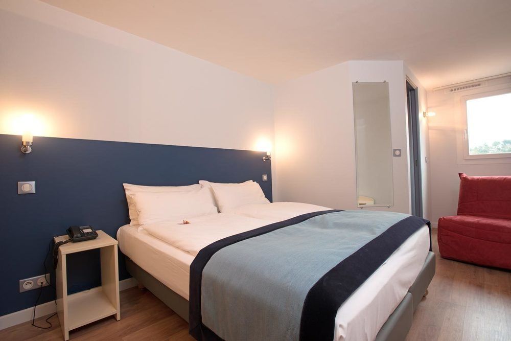 Hotel L'Amandier Nanterre Eksteriør bilde