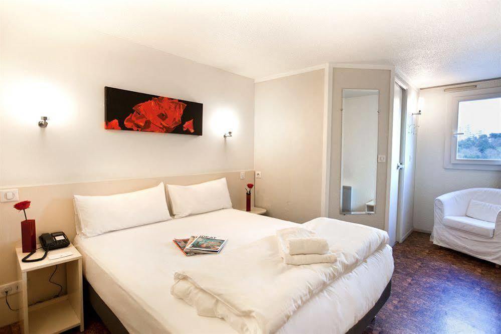 Hotel L'Amandier Nanterre Eksteriør bilde